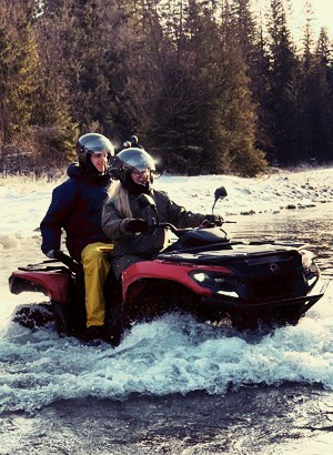 River crossing with quad bikes during day trip from Krakow River crossing with quad bikes during day trip from Krakow
